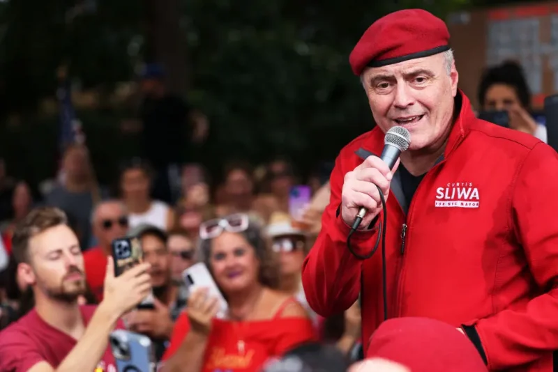 NEW YORK, NEW YORK - AUGUST 27: Guardian Angels founder Curtis Sliwa speaks during an anti-migrant rally and protest outside of Gracie Mansion on August 27, 2023 in New York City. Guardian Angels founder Curtis Sliwa was joined by local officials and hundreds of protestors, as he held another anti-migrant protest after staging several in Brooklyn and Queen against the migrant relief shelters in the boroughs. NYPD made several arrests, including Sliwa and two supporters who were arrested for civil disobedience. According to the latest data from the city, there are more than 59,000 migrants in city shelters, with hundreds more arriving every week. (Photo by Michael M. Santiago/Getty Images)