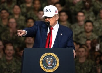President Donald Trump delivers a speech to U.S. Navy personnel on board the USS George Washington aircraft carrier at the US naval base in Yokosuka, Japan, on Tuesday.