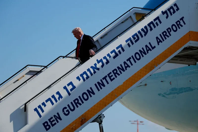 TEL AVIV, ISRAEL - OCTOBER 13: U.S. President Donald Trump disembarks from Air Force One as he arrives at Ben Gurion International Airport on October 13, 2025 in Tel Aviv, Israel. President Trump is visiting the country hours after Hamas released the remaining Israeli hostages captured on Oct. 7, 2023, part of a US-brokered ceasefire deal to end the war in Gaza. (Photo by Chip Somodevilla/Getty Images)