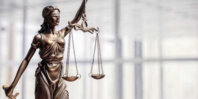 statue of justice and the scales