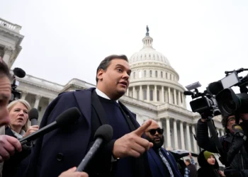 WASHINGTON, DC - DECEMBER 01: Rep. George Santos (R-NY) is surrounded by journalists as he leaves the U.S. Capitol after his fellow members of Congress voted to expel him from the House of Representatives on December 01, 2023 in Washington, DC. Charged by the U.S. Department of Justice with 23 felonies in New York including fraud and campaign finance violations, Santos, 35, was expelled from the House of Representatives by a vote of 311-114. Santos is only the sixth person in U.S. history to be expelled from the House of Representatives. (Photo by Drew Angerer/Getty Images)