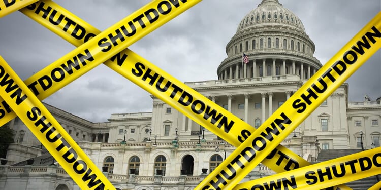 Congress covered in yellow tapes labeled "shutdown"