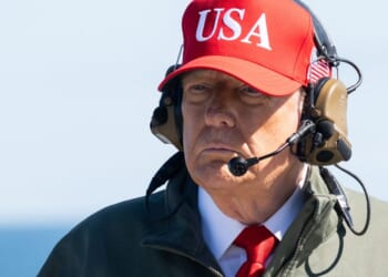 President Donald Trump visits the USS George H.W. Bush aircraft carrier near Norfolk, Virginia, as part of the U.S. Navy's 250th anniversary celebration on Sunday.
