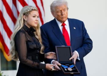 President Donald Trump, right, posthumously awards the Presidential Medal of Freedom to late conservative activist Charlie Kirk as he presents the Medal to his wife Erika Kirk, left, in the Rose Garden of the White House in Washington, D.C., on Tuesday.