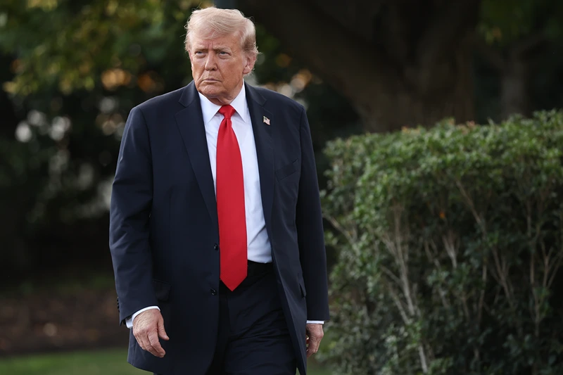 WASHINGTON, DC - SEPTEMBER 11: U.S. President Donald walks toward reporters while departing the White House on September 11, 2025 in Washington, DC. Trump is scheduled to travel to New York City this evening. (Photo by Win McNamee/Getty Images)