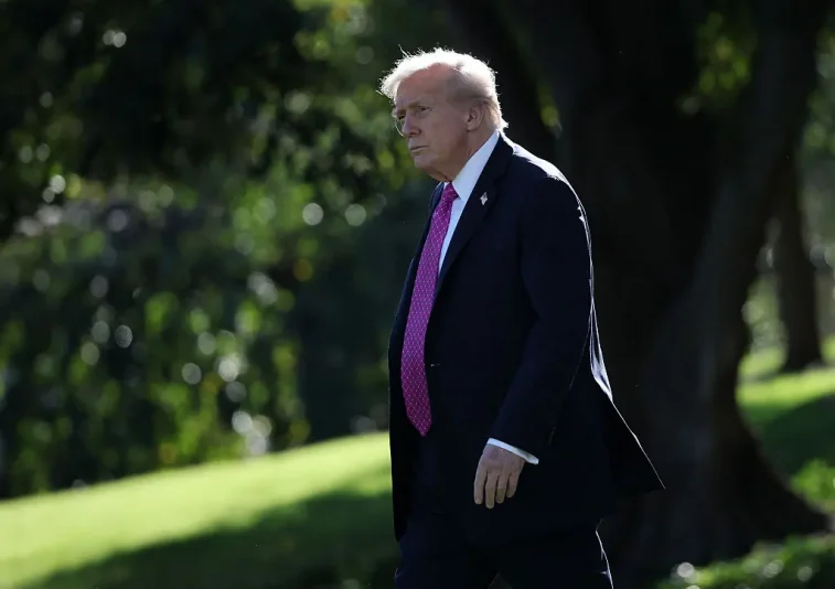 WASHINGTON, DC - OCTOBER 17: U.S. President Donald Trump walks across the South Lawn of the White House as he prepares to board Marine One on October 17, 2025 in Washington, DC. President Trump is traveling to Florida for the weekend. (Photo by Win McNamee/Getty Images)