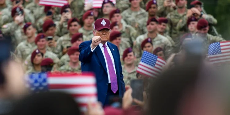 FORT BRAGG, NORTH CAROLINA - JUNE 10: U.S. President Donald Trump pumps his fist to the crowd as he leaves the stage after speaking at a rally with U.S. Army troops on June 10, 2025 at Fort Bragg, North Carolina. Trump is traveling to Fort Bragg Army base to observe a military demonstration and give remarks in honor of the U.S. Army’s 250th anniversary. (Photo by Melissa Sue Gerrits/Getty Images)