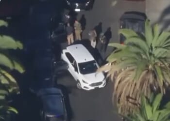 Fox News reported the immigrant was shot in the elbow and a U.S. Marshall sustained a hand injury, possibly from a bullet that ricocheted.