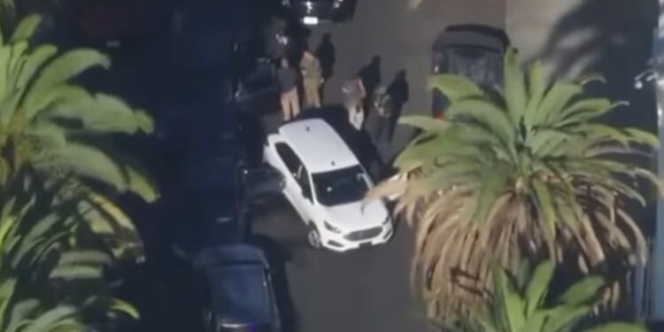 Fox News reported the immigrant was shot in the elbow and a U.S. Marshall sustained a hand injury, possibly from a bullet that ricocheted.