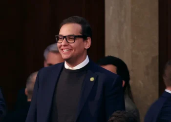WASHINGTON, DC - JANUARY 05: U.S. Rep.-elect George Santos (R-NY) watches proceedings in the House Chamber during the third day of elections for Speaker of the House at the U.S. Capitol Building on January 05, 2023 in Washington, DC. The House of Representatives is meeting to vote for the next Speaker after House Republican Leader Kevin McCarthy (R-CA) failed to earn more than 218 votes on several ballots; the first time in 100 years that the Speaker was not elected on the first ballot. (Photo by Win McNamee/Getty Images)