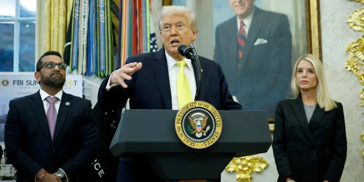 WASHINGTON, DC - OCTOBER 15: U.S. President Donald Trump speaks as Federal Bureau of Investigation Director Kash Patel (L) and U.S. Attorney General Pam Bondi look on during a press conference in the Oval Office of the White House on October 15, 2025 in Washington, DC. Trump and Patel provided an update on the Trump administration’s progress in reducing violent crime. (Photo by Kevin Dietsch/Getty Images)