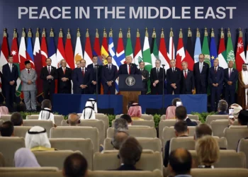 US President Donald Trump (C) delivers a statement during a summit on Gaza in Sharm el-Sheikh on October 13, 2025. US President Donald Trump hailed a "tremendous day for the Middle East" as he and regional leaders signed a declaration on October 13, 2025 meant to cement a ceasefire in Gaza, hours after Israel and Hamas exchanged hostages and prisoners. (Photo by Yoan VALAT / POOL / AFP) (Photo by YOAN VALAT/POOL/AFP via Getty Images)