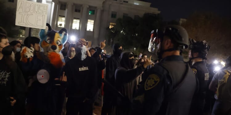UC Berkeley Student Radicals Clash With Police, Attack Conservatives Outside TPUSA Event Honoring Charlie Kirk