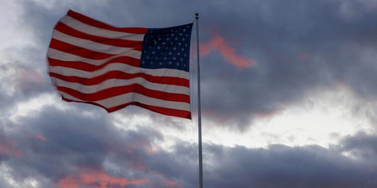 An American flag waves in the wind in Bloomington, Indiana, on Nov. 26, 2025.