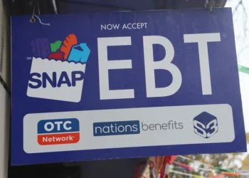NEW YORK, NEW YORK - OCTOBER 30: An EBT sign is displayed on the window of a grocery store on October 30, 2025 in the Flatbush neighborhood of the Brooklyn borough in New York City. Supplemental Nutrition Assistance Program (SNAP) benefits and other assistance are set to stop on November 1st amid a federal government shutdown that has been going on for 29 days and is the second-longest shutdown in the nation