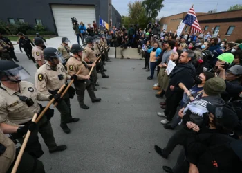 BROADVIEW, ILLINOIS - OCTOBER 17: Police interact with demonstrators near the "Free Speech Zone" outside of the immigrant processing and detention center on October 17, 2025, in Broadview, Illinois. Demonstrations have been taking place outside of the facility for several weeks as the Trump administration