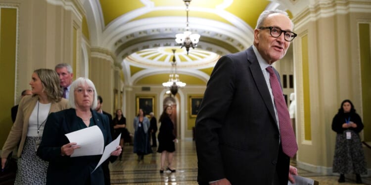 Senate Minority Leader Chuck Schumer, a Democrat from New York, walks to the microphone before speaking at the Weekly Senate Policy Luncheon news conference on Nov. 4, 2025, on Capitol Hill in Washington, D.C.