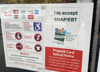 A sign advertising "We Accept SNAP and EBT" posted outside a store in Lafayette, California, on Nov. 4, 2025.