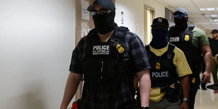 U.S. federal agents working for Immigration and Customs Enforcement (ICE) detain immigrants and asylum seekers reporting for immigration court proceedings at the Jacob K. Javits Federal Building