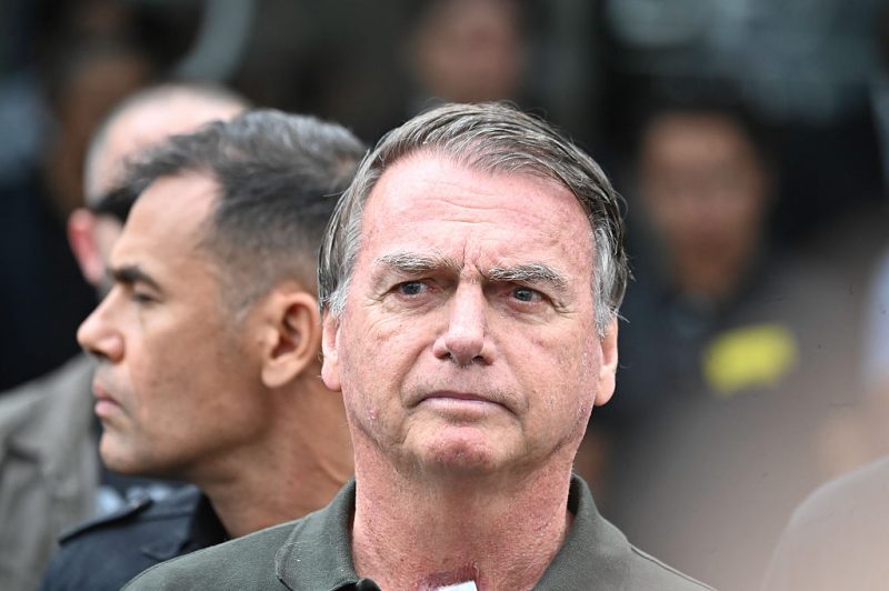 BRASILIA, BRAZIL - SEPTEMBER 14: Former Brazilian President Jair Bolsonaro leaves DF Star Hospital after undergoing a medical procedure on September 14, 2025, in Brasília, Brazil. Bolsonaro ruled the country from 2019 to 2022 and was sentenced to 27 years in prison for a coup plot after his defeat to Lula da Silva in the 2022 presidential election. The right-wing former president also faces four additional charges related to attacks on democratic order. (Photo by Ton Molina/Getty Images)