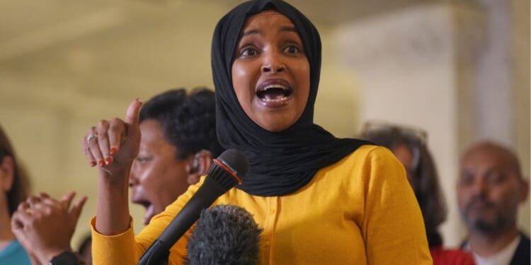 Minnesota Democrat Rep. Ilhan Omar, a Somali immigrant, seen in an August photo, led a protest over the Trump administration's ending of Temporary Protected Status for Somalians, which has been in place since 1991.