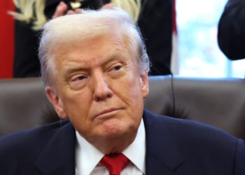 President Donald Trump looks on during the swearing-in ceremony of U.S. Ambassador to India Sergio Gor in the Oval Office of the White House on Nov. 10, 2025, in Washington, D.C.