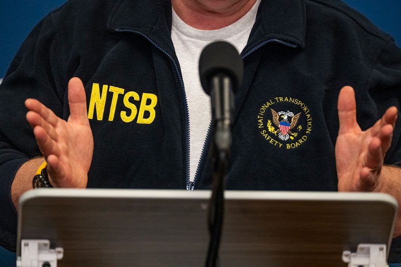 LOUISVILLE, KENTUCKY - NOVEMBER 5: J. Todd Inman, 48th member of the NTSB Board, and Chihoon Shin, NTSB lead crash investigator, speak during a press conference at Louisville Muhammad Ali International Airport on November 05, 2025 in Louisville, Kentucky. Nine people were killed and a shelter-in-place order was instituted after a fully fueled UPS cargo plane crashed shortly after takeoff near the airport. (Photo by Michael Swensen/Getty Images)