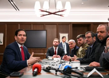 US Secretary of State Marco Rubio (L) speaks during a meeting with Ukrainian officials headed by Secretary of the National Security and Defense Council of Ukraine Rustem Umerov (R) in Hallandale Beach, Florida on November 30, 2025. (Photo by CHANDAN KHANNA / AFP via Getty Images)