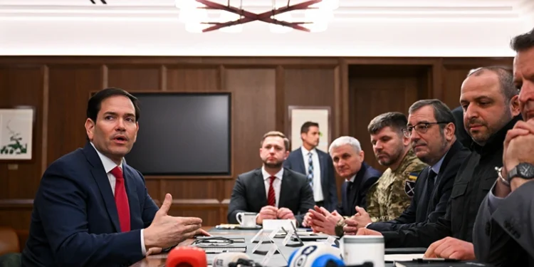 US Secretary of State Marco Rubio (L) speaks during a meeting with Ukrainian officials headed by Secretary of the National Security and Defense Council of Ukraine Rustem Umerov (R) in Hallandale Beach, Florida on November 30, 2025. (Photo by CHANDAN KHANNA / AFP via Getty Images)