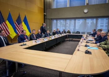US Secretary of State Marco Rubio (5th L), US special envoy Steve Witkoff (4th L), US Secretary of the Army Daniel Driscoll (taking his seat) and US President Donald Trump