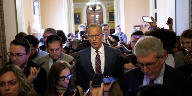 WASHINGTON, DC - NOVEMBER 10: Senate Majority Leader John Thune (R-SD) speaks to reporters while walking to his office on November 10, 2025 on Capitol Hill in Washington, DC. The Senate reached a deal late Sunday to fund the Government, aiming to end the longest shutdown in history. (Photo by Tom Brenner/Getty Images)