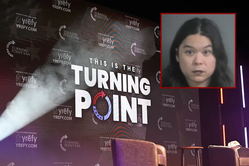 The Turning Point USA logo is seen on the stage during an "American Comeback Tour" stop in Burruss Hall at Virgina Tech university in Blacksburg, Virginia, on September 24, 2025. The event is being held two weeks after the killing of right-wing activist and co-founder of Turning Point USA Charlie Kirk during an "American Comeback Tour" stop in Orem, Utah on September 10. (Photo by Alex WROBLEWSKI / AFP) (Photo by ALEX WROBLEWSKI/AFP via Getty Images) / Justin Pham Calhoon