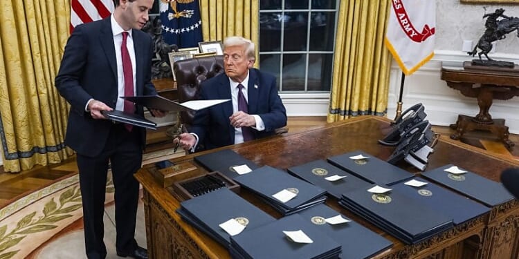 Trump signing pardons