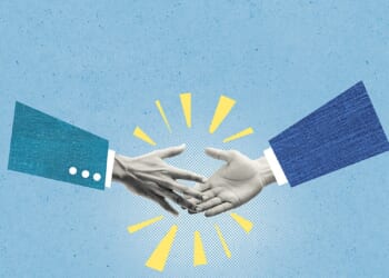 Two businessmen shaking hands