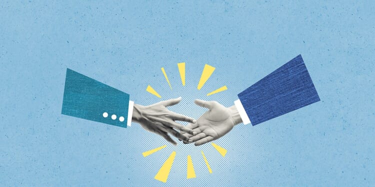 Two businessmen shaking hands