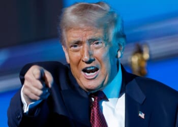 President Donald Trump gestures after delivering remarks during the America Business Forum in Miami, Florida, on Wednesday.