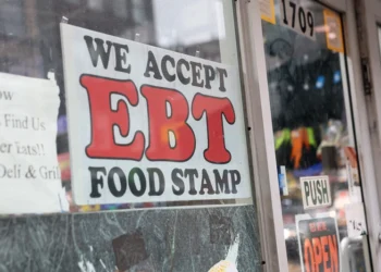 NEW YORK, NEW YORK - OCTOBER 30: An EBT sign is displayed on the window of a grocery store on October 30, 2025 in the Flatbush neighborhood of the Brooklyn borough in New York City. Supplemental Nutrition Assistance Program (SNAP) benefits and other assistance are set to stop on November 1st amid a federal government shutdown that has been going on for 29 days and is the second-longest shutdown in the nation