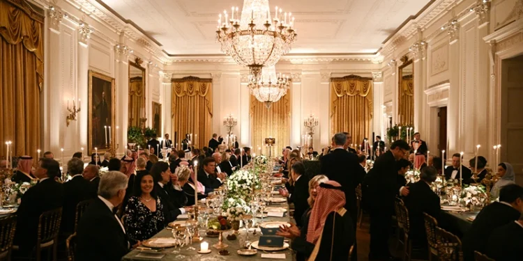 Guests gather for an official dinner with US President Donald Trump and Crown Prince and Prime Minister of the Kingdom of Saudi Arabia Mohammed bin Salman in the East Room of the White House in Washington, DC on November 18, 2025. (Photo by Brendan SMIALOWSKI / AFP) (Photo by BRENDAN SMIALOWSKI/AFP via Getty Images)