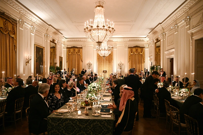 Guests gather for an official dinner with US President Donald Trump and Crown Prince and Prime Minister of the Kingdom of Saudi Arabia Mohammed bin Salman in the East Room of the White House in Washington, DC on November 18, 2025. (Photo by Brendan SMIALOWSKI / AFP) (Photo by BRENDAN SMIALOWSKI/AFP via Getty Images)
