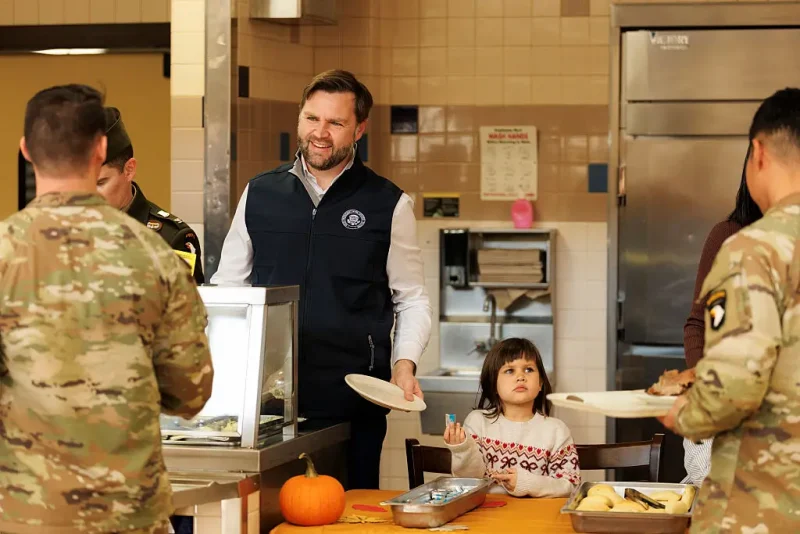 FORT CAMPBELL, TENNESSEE - NOVEMBER 26: U.S. Vice President JD Vance serves members of the 101st Airborne Division at Fort Campbell on November 26, 2025 in Fort Campbell, Tennessee. (Photo by Brett Carlsen/Getty Images)
