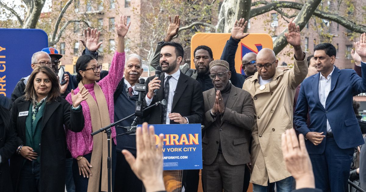 Democratic New York City mayoral candidate Zohran Mamdani, center, asked rally goers Saturday to raise their hands if they'd been accused of being a terrorist.