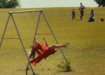 Grammy-nominated country star Kelsea Ballerini questions her life choices in her song "I Sit in Parks."