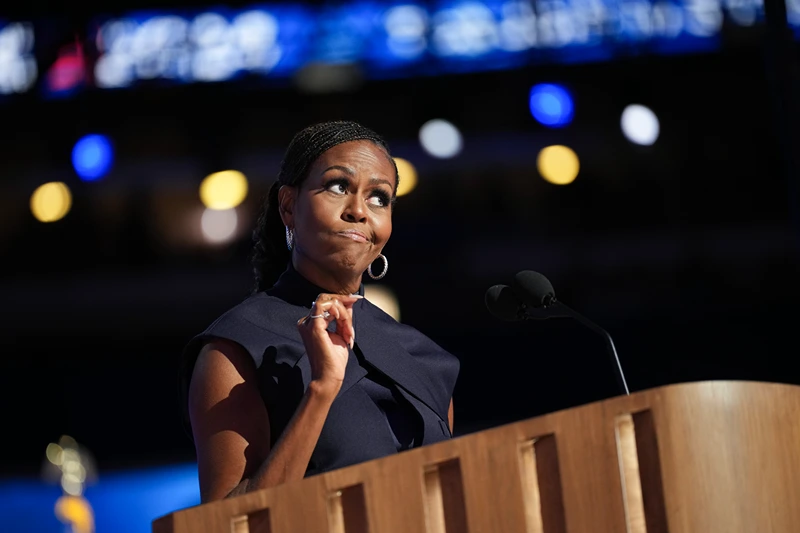 CHICAGO, ILLINOIS - AUGUST 20: Former first lady Michelle Obama speaks on stage during the second day of the Democratic National Convention at the United Center on August 20, 2024 in Chicago, Illinois. Delegates, politicians, and Democratic Party supporters are gathering in Chicago, as current Vice President Kamala Harris is named her party
