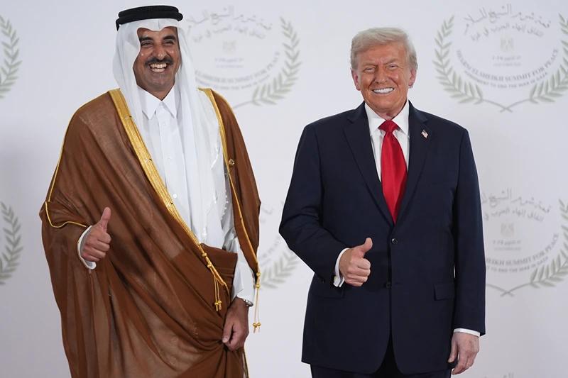 SHARM EL-SHEIKH, EGYPT - OCTOBER 13: President Donald Trump poses with Qatar Prime Minister and Foreign Minister Sheikh Mohammed bin Abdulrahman bin Jassim Al Thani during a world leaders
