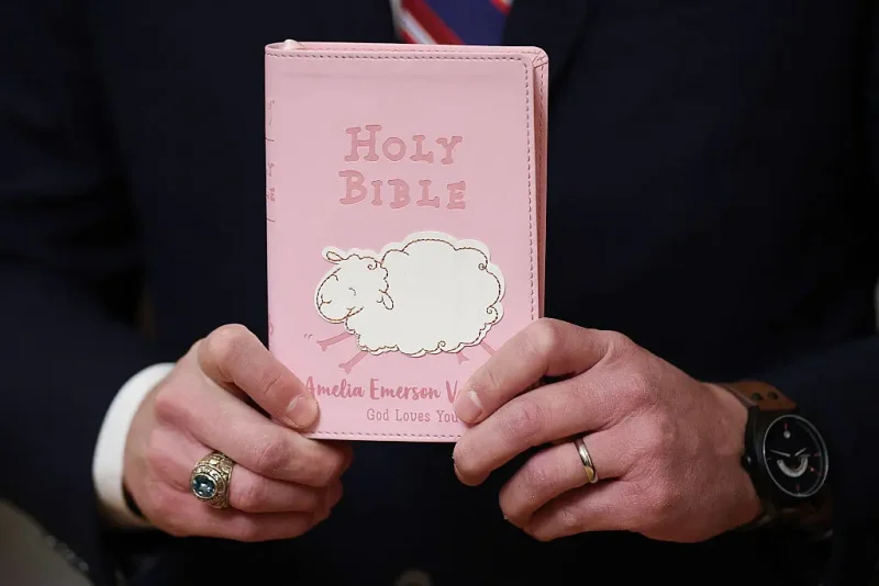 WASHINGTON, DC - DECEMBER 04: Rep. Matt Van Epps holds up his daughter's bible before a ceremonial swearing-in December 4, 2025 in Washington, DC. Van Epps won a special congressional election in Tennessee earlier in the week prior to being sworn in today. (Photo by Win McNamee/Getty Images)