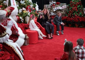 First Lady Melania Trump visits D.C. children’s hospital, reading to young patients and meeting them individually alongside Santa