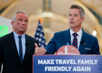 ARLINGTON, VA - DECEMBER 08: U.S. Transportation Secretary Sean P. Duffy (R) speaks alongside Human Services Secretary Robert F. Kennedy Jr. at a conference discussing the launch of the "Make Travel Family Friendly Again" campaign at Ronald Reagan Washington National Airport on December 08, 2025 in Arlington, Virginia. The campaign
