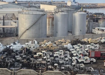 A photograph shows damaged military vehicles, reportedly sent by the United Arab Emirates to support Southern Transitional Council (STC) separatist forces, following an air strike carried out by the Saudi-led coalition in the port of Mukalla, southern Yemen, on December 30, 2025. Saudi Arabia on December 30 called the UAE