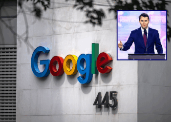 (Background) The Google logo is pictured at the company