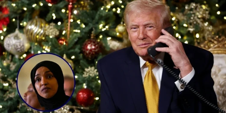 (Background) U.S. President Donald Trump calls children as he participates in tracking Santa Claus